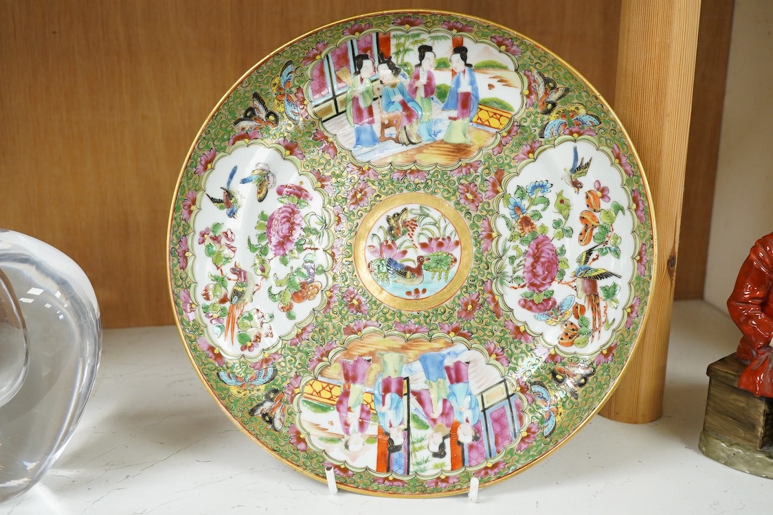 A 19th century Chinese famille rose porcelain dish enamelled with figures and flowers, 25cm in diameter